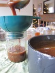 Filling jars with caramel&nbsp;sauce